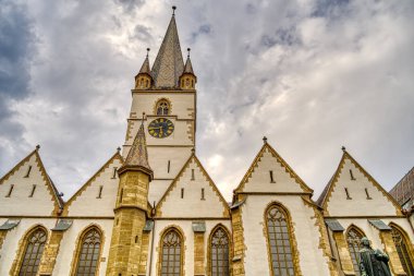 SIBIU, ROMANIA - AUGUST 2022: Historical center in cloudy weather, HDR Image