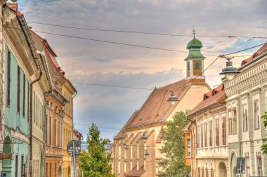 SIBIU, ROMANIA - AUGUST 2022: Historical center in cloudy weather, HDR Image