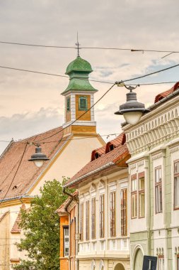 SIBIU, ROMANIA - AUGUST 2022: Historical center in cloudy weather, HDR Image