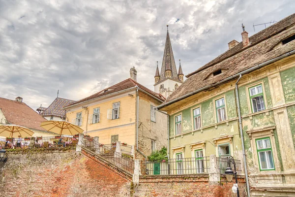 SIBIU, ROMANIA - AUGUST 2022: Historical center in cloudy weather, HDR Image