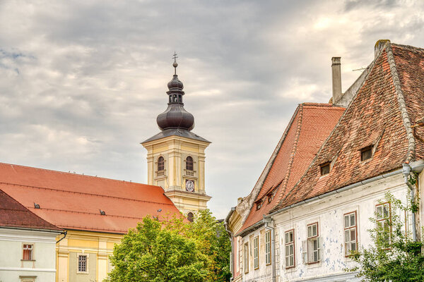 SIBIU, ROMANIA - AUGUST 2022: Historical center in cloudy weather, HDR Image