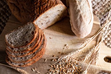 Bread and raw cereals from above, seeds and slices
