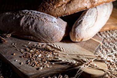Rustic baked bread with raw cereals seeds