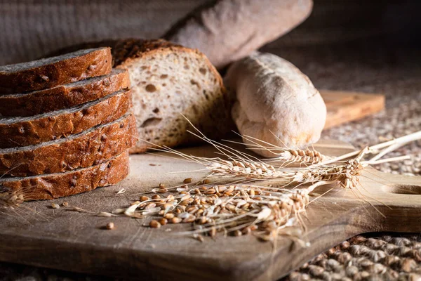 Rustic bread variety with wheat seeds in the studio shoot