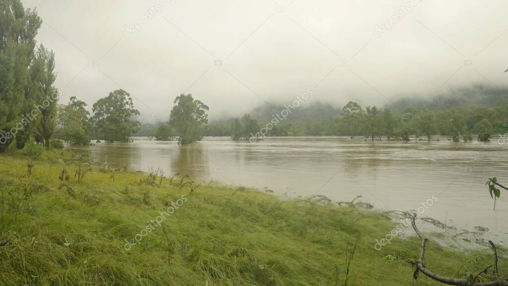 wide shot of the nepean river in flood