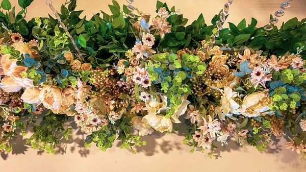 a closeup shot of a white and pink flowers with a green leaf