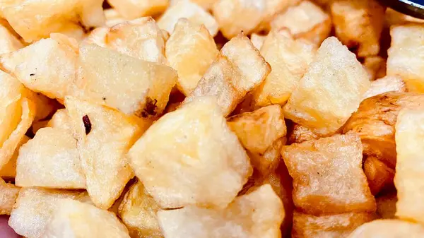 close up of fried crispy chips in a market.