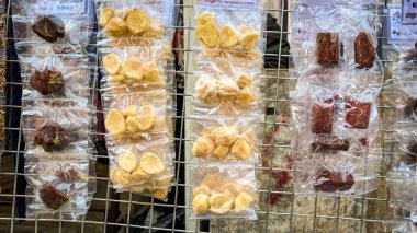 close up of delicious food on plastics being sold at the market