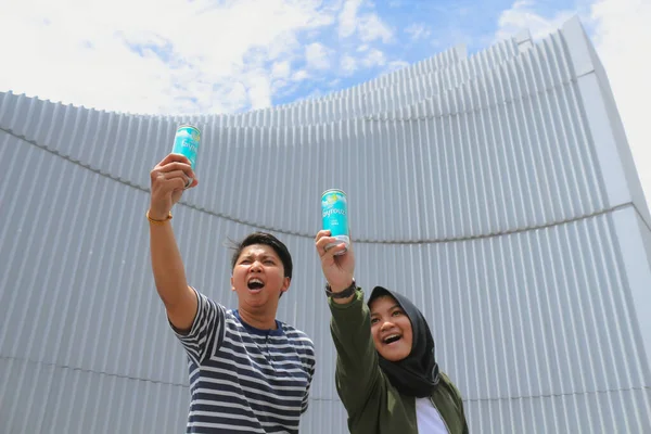 youngsters with a bottle of water