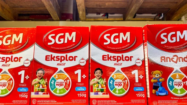 a closeup of a red kid formula milk at store of a supermarket