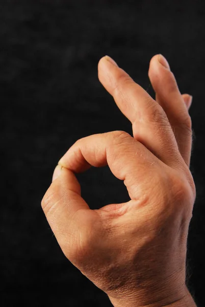 Gesture Thumb Joined Index Finger Positive Sign Dark Background — Fotografia de Stock