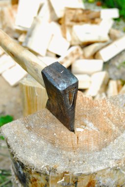 The ax cut into a block of wood