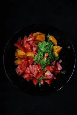 Fresh salad - cucumbers, red and yellow tomatoes