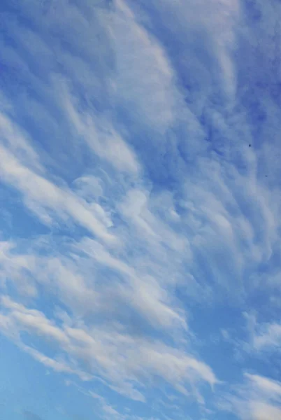 vibrant morning sky with white clouds