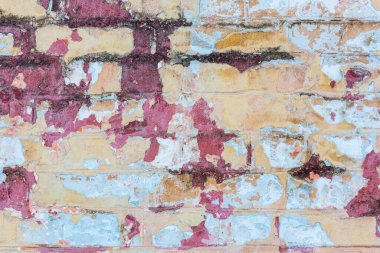 Soyulmuş alçı ve boya ile eski, eski, kirli tuğla duvarın arka planı