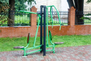 Close-up of an outdoor gym on a sports field in a park. Exercise stations in the public park. Free outdoor gym.