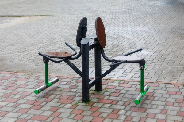 Close-up of an outdoor gym on a sports field in a park. Exercise stations in the public park. Free outdoor gym.