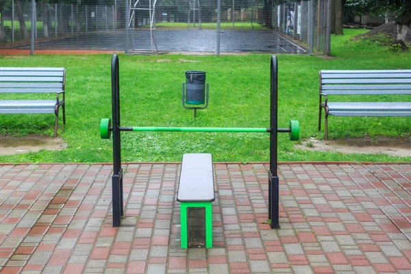 Close-up of an outdoor gym on a sports field in a park. Exercise stations in the public park. Free outdoor gym.