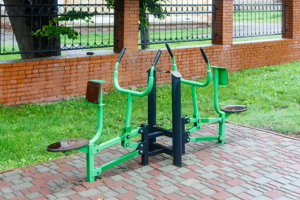 Close-up of an outdoor gym on a sports field in a park. Exercise stations in the public park. Free outdoor gym.