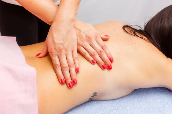 Relaxed Young Woman Lying Face Massage Table Enjoying Therapeutic Body — Foto de Stock