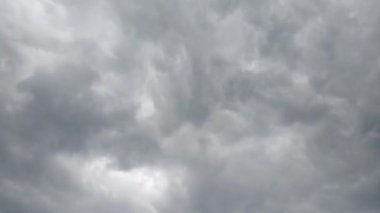 Time-lapse of dramatic changes in storm clouds moving in the sky. Dark cumulus clouds change shape in space. beautiful sky Dramatic atmosphere, time-lapse, and weather change. amazing nature