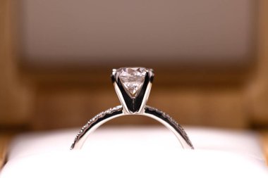 Diamond wedding or engagement ring in a box