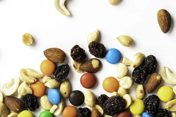 Trail mix including peanuts, almonds, cashews, raisins, and chocolate