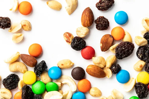 Trail mix including peanuts, almonds, cashews, raisins, and chocolate