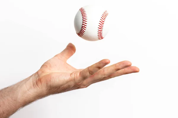 Een Honkbal Gegooid Uit Een Hand Een Witte Achtergrond — Stockfoto