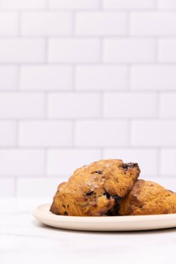 Fresh baked scone shot in a kitchen scene 