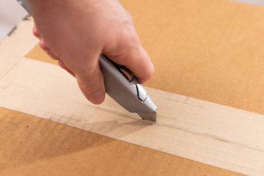 Box cutter that is silver with the blade out