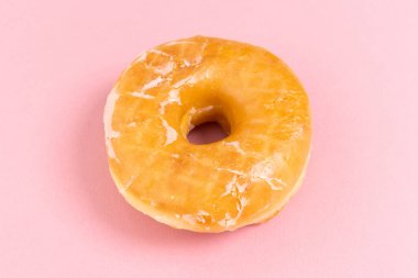 Doughnut or donut on a simple background