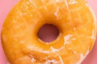 Doughnut or donut on a simple background