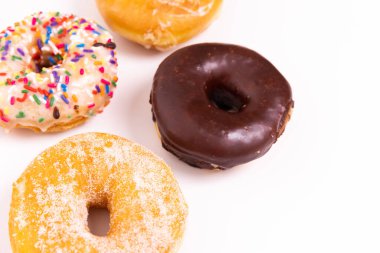 Doughnuts or donuts on a simple background