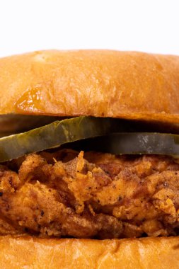 A crispy fried chicken sandwich shot close up