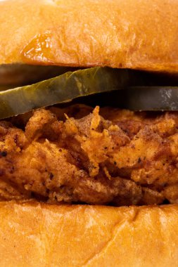 A crispy fried chicken sandwich shot close up