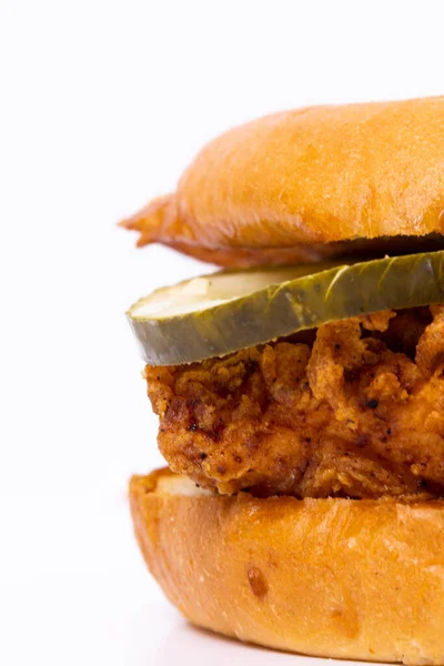 A crispy fried chicken sandwich shot close up