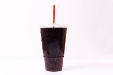 Soda or pop plastic cup with a straw