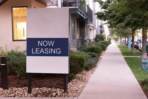 Now leasing sign outside of a nice property