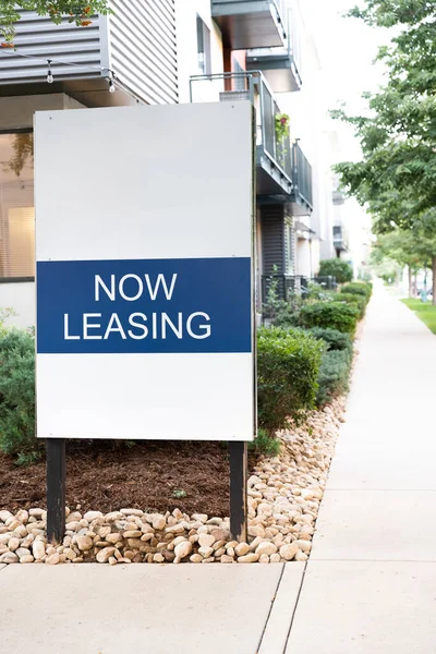 Now leasing sign outside of a nice property