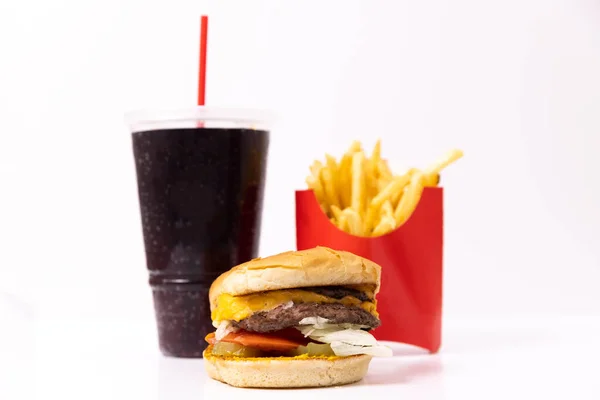 Fast food meal with a burger, drink, and french fries