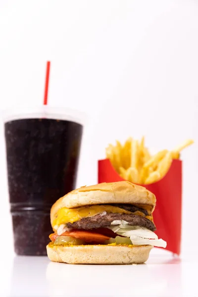 Fast food meal with a burger, drink, and french fries