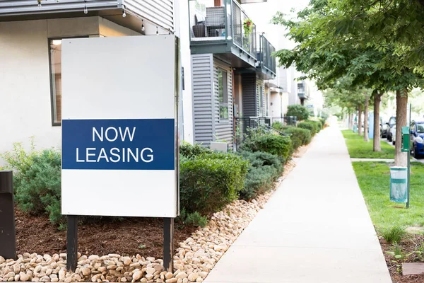 Now leasing sign outside of a nice property