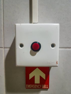 close up of An emergency call button installed on the wall in a hospital patient rest room