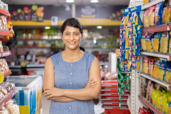 Happy Woman Owner Arms Crossed Grocery Aisle Supermarket — Stock Photo, Image
