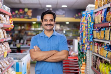Happy man at supermarket store