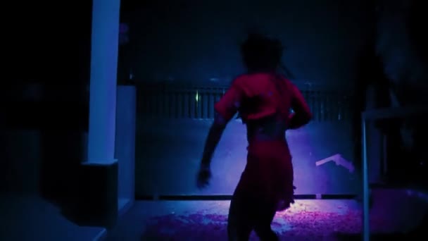 Heartbroken Asian Women Dancing Front Black Fence Purple Lighting Dark — Stockvideo