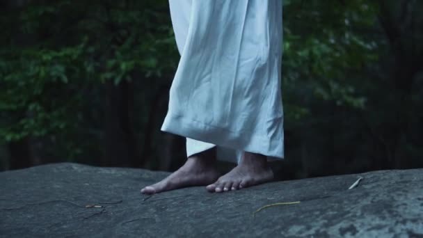 Arabian Man Standing Grey Rock Forest White Clothes Morning — Stockvideo