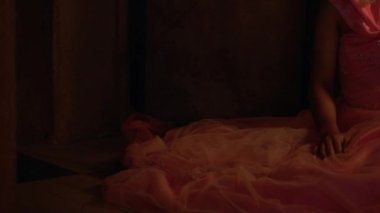 A Sad Princess Fainted to the floor while getting failed by her husband in the dark night inside the palace