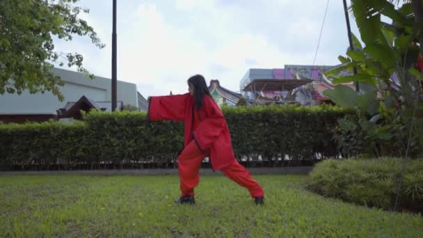 Asian Gets Martial Art Education While Wearing Red Chinese Costume — Vídeo de Stock
